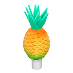 an orange and green pineapple shaped object on a white background