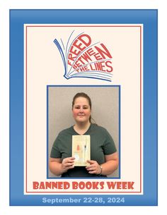 a woman holding up a book in front of a sign that reads banned books week