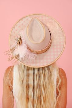 Introducing THE MARGARET RANCHER HAT - a cream rancher with gold details, including a pink bow and gingham print, gold ribbon band, and a playful pink and gold feather combo. Accessorize with the included gold pins for the perfect mix of charm and style. Yeehaw! This hat is ONE OF A KIND, created by our owner Stephanie Gold Flat Brim Hat Bands For Kentucky Derby, Gold Brimmed Fedora For Kentucky Derby, Gold Fedora Straw Hat For Kentucky Derby, Gold Fedora For Kentucky Derby, Gold Western Hat Band For Kentucky Derby, Western Gold Hat Bands For Kentucky Derby, Pink Fedora For Kentucky Derby Party, Fedora Hat Bands For Kentucky Derby Gift, Adjustable Gold Fedora For Kentucky Derby