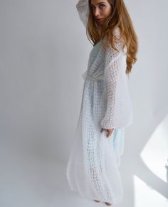 Hello, I'm the one, who won't let you down - white mohair cardigan. I will comfort you, keep you warm and will make you smile. I'm 100% hand made and proud of that. I consist of 70% italian kid mohair and 30% of nylon, which makes me incredibly natural. I'm quite unique as could be worn all year long. I'm in one size and one size fits all because my measurements are : ❤️ Width -52 cm ❤️ Lengths -123 cm If you would like me in other size, you could request a custom order with your own parameters, White Mohair Cardigan For Winter, Wedding Knit, White Mohair Winter Outerwear, Cozy White Mohair Cardigan, Luxury Cream Mohair Cardigan, Luxury Hand-knitted Mohair Cardigan, Hand Knit Cardigan, Wedding Cardigan, Wedding Shrug