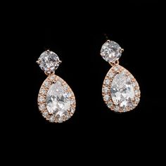 Indulge in the glamour of our Rose Gold Crystal Teardrop Earrings. Elevate your style with timeless elegance and eye-catching allure. Perfect for weddings and formal events. Crystal Teardrop Earrings, Wedding Earrings Drop, Rose Gold Crystal, Gold Crystal, Wedding Earrings, Teardrop Earrings, Formal Event, Timeless Elegance, Cubic Zirconia