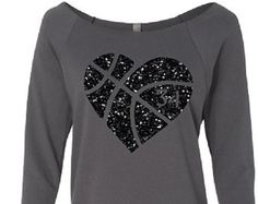 a women's sweatshirt with a basketball in the shape of a heart on it