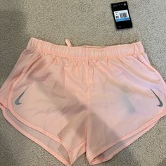 Never Before Worn! Light Pink Nike Running Shorts Size M Nike Shorts For Spring, Nike Athletic Shorts For Spring, Nike Summer Activewear Shorts, Nike Spring Activewear Shorts, Nike Spring Activewear, Nike Athleisure Shorts For Spring, Pink Athletic Shorts With Pockets For Spring, Nike Summer Athletic Fitted Shorts, Nike Pink Bottoms For Spring