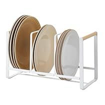 a white rack with plates on it and two racks holding them in the same place