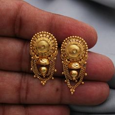 Discover the allure of Handmade Gold Jewelry at https://morvijewels.etsy.com/   Get a dazzling 25% off on all our 22k and 18k gold pieces. Don't miss out on this limited-time offer. Shop now and embrace the radiance of gold!22k gold earrings jewelry for wedding and party wear Metal - 22k Gold Product - Earring Length - 3.3 cm approx Width - 1.5 cm approx    Weight - 5.71 Grams Approx   The earrings comes with normal push  If you want real gold push please let us know. Click here  https://morvije 22k Gold Chandbali Danglers With Latkans, 22k Gold Danglers For Wedding And Diwali, Bollywood Bridal Earrings With Intricate Design In 22k Gold, 22k Gold Wedding Danglers For Diwali, 22k Gold Chandbali Bridal Earrings With Latkans, Ornate Earrings With Intricate Design For Diwali, Traditional Heavy 22k Gold Earrings, Bollywood 22k Gold Chandbalis, Bollywood Style 22k Gold Chandbalis