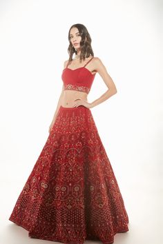 A red raw silk skirt with resham, sequins, and mirror embroidery paired with a quilted bralette and net dupatta From Chamee and Palak 's The Wedding Edit collectionDELIVERY TIMEPlease allow 8-12 weeks for your outfit to arrive.FABRIC DETAILSRaw silk and NetProfessional cleaning only. Party Wear Raw Silk Choli With Intricate Embroidery, Party Wear Embroidered Lehenga In Raw Silk, Navratri Party Gown With Intricate Embroidery, Red Party Wear Set With Dupatta, Party Wear Embroidered Gown For Navratri, Embroidered Party Wear Gown For Navratri, Embroidered Party Gown For Navratri, Embroidered Party Wear Choli For Reception, Festive Party Wear Embroidered Fabric For Reception