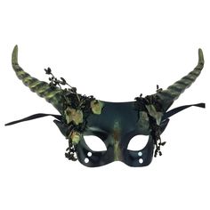 Transform into a legendary woodland creature with the Woodland Mystical Creature Mask! Its fun horns and earthy design make it perfect for Mardi Gras, fantasy parties, or just impressing your pet cat. It’s time to leave the boring behind and embrace your magical side—this mask is here to help you do just that. Fantasy Masks For Halloween, Fantasy Halloween Masks, Fantasy Costume Mask For Costume Party, Green Halloween Cosplay Mask, Horned Masquerade Mask For Halloween Cosplay, Fantasy Masks And Prosthetics For Mardi Gras Cosplay, Green Halloween Masquerade Mask And Prosthetics, Horned Fantasy Masquerade Mask For Halloween, Green Halloween Masquerade Mask