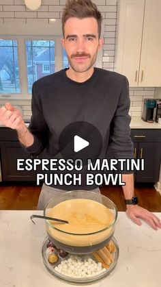 a man standing in front of a bowl filled with food