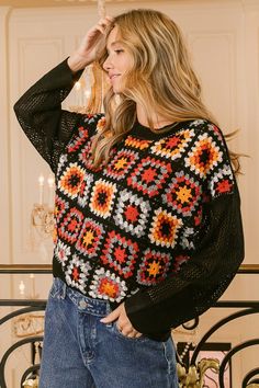 This sweater top showcases a charming granny square design on the front for a retro-inspired look. The intricate crochet work adds a unique and cozy touch to the piece. Perfect for adding a vintage flair to your outfit and standing out from the crowd. The sweater top is versatile and can be dressed up with a skirt or dressed down with jeans for a casual vibe. A stylish and trendy choice for layering during the colder months or for creating a boho-chic ensemble. A fun and eye-catching addition to Boho Sweaters, Granny Square Sweater, Intricate Crochet, Grandma Fashion, Denim Short Dresses, Crochet Work, Patchwork Top, Retro Tops, Poncho Sweater