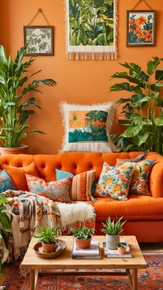 a living room with an orange couch and potted plants on the table in front of it