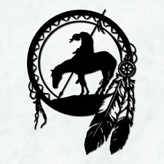 the silhouette of a man on a horse in a circle with an arrow and feathers