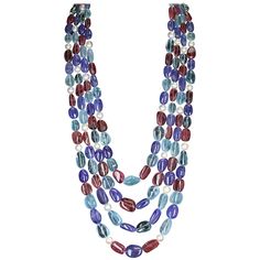 A candy-like three-strand necklace with smooth tumbled beads of Aquamarine, Tourmaline & Tanzanite with Pearls. The lengths of the strands range from 23" to 29" and the beads range from 9 x 7 MM to 19 x 14MM. GW: 1577 cts. 14K WG Clasp. Clasp can be changed according to preference and strands can be sold separately. Tanzanite Beads, Three Strand Necklace, Miriam Haskell Jewelry, Pearl Strands Necklace, Coin Pearls, Tourmaline Necklace, Tourmaline Beads, Star Jewelry, Jewelry Making Tutorials