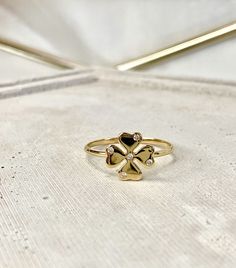 *14k Solid Gold Ring, Four Leaf Clover, Good Luck Ring, Gold Ring, Gift For Her, Mini Clover *Personalized piece for your self or for someone special in your life PRODCUT DETAİLS: 14K (585) GOLD ( Not fill or plated) Band Width: 1.3 mm Stones: Zircon HOW TO ORDER: Please Select Your Preferred Ring Size From The Menu WHY CHOOSE US -We have the best quality and price -It's dainty and can be worn every day -High quality materials ATTENTION INTERNATIONAL BUYERS: The recipient is the importer of reco Gold Birthstone Necklace, Lucky Ring, Blue Chalcedony Ring, Lemon Quartz Ring, Sideways Initial Necklace, Clover Ring, Clover Jewelry, Four Leaf Clover Necklace, Chalcedony Ring