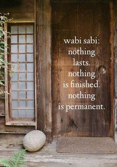 a wooden door with a quote written on the front and side panels above it that reads wabi sabi nothing lasts nothing is finished nothing is finished nothing is permanent