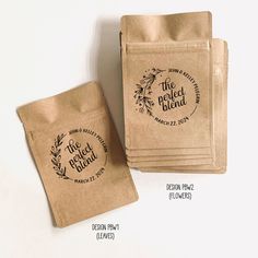 three brown paper bags sitting next to each other