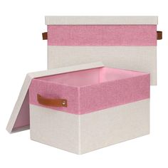 a pink and white storage box with leather handles