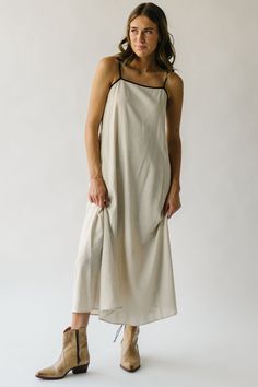 Introducing the Bradish Maxi Tank Dress! With its flowing silhouette and natural color, it's the perfect blend of elegance and comfort. Designed with a built-in maxi tank, this dress offers a versatile, yet easy-to-wear option for any occasion. Elevate your wardrobe and turn heads in this must-have piece! Details self/lining: 70% viscose + 30% linen Fabric Care Guide Here Sizing & Fit Measurements are approximate and taken while laying flat across the front. Not doubled. small: bust = 16.5"; len Ruffled Denim Jacket, Piper And Scoot, Puff Sleeve Sweater, Striped Sweater Dress, Striped Knit Dress, Maxi Tank Dress, Cardigan Jacket, Striped Knit, Small Bust