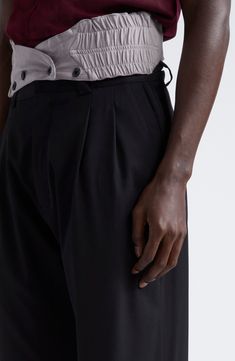 Pleats and piping create a surprising tailored sport vibe to stretchy wool trousers that contemporize your workwear. Zip fly with hook-and-bar closure Side-seam pockets; back welt pockets 97% virgin wool, 3% elastane with 100% cotton trim Dry clean Made in Portugal Designer Clothing Black Tailored Bottoms With Straight Hem, Modern Tailored Black Pants, Kiko Kostadinov, Wool Trousers, Wool Pants, Welt Pockets, Piping, Designer Clothing, Work Wear