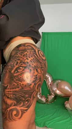 a woman with a tattoo on her thigh