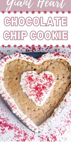 a heart shaped chocolate chip cookie with sprinkles in the shape of a heart