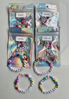 two bags filled with different types of beads