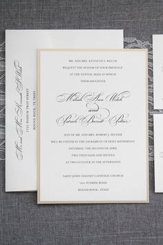 the wedding stationery was done in black and white calligraphy, which were accented with silver foil