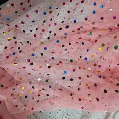 "Use this rainbow confetti dot tulle to sew your own party dresses, canopies, nursery decor, accessories, home decor, and more. This fabric has a luxurious feel and soft drape. The listing is for 1 yard. If you order more, we will send them in one continuous piece. Width:about 61\"(155 cm) Form top to bottom. Transparent tulle lace fabric,colorful Polka Dots. The material of this lace fabric is fresh and high quality. Suitable for Skirt Bottoming, wedding dress, evening dress, illusion gowns, co Pink Tulle Fabric For Summer Parties, Pink Sequin Tulle Fabric For Party, Pink Tulle Sequin Fabric For Party, Multicolor Tulle Fabric For Spring Party, Spring Party Multicolor Tulle Fabric, White Tulle Fabric, Rainbow Confetti, Rainbow Polka Dots, Confetti Dots