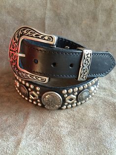 "ETW Holsters custom built this leather studded belt with Indian head (3) and buffalo (6) conchos. Belt is 1 1/2\" in diameter with stainless steel buckle. Made for men and women. Please make sure you order the correct size. Belt size is typically 2\" larger than your pant size. We are not responsible for wrong size orders. Custom made leather belt" Leather Concho Belts For Western-themed Events, Silver Leather Concho Belt Buckles, Festival Leather Concho Belts, Leather Concho Belts For Festivals, Hand Tooled Silver Leather Belt Buckles, Goth Belt, Pancake Holster, Custom Leather Belts, French Wedding Style