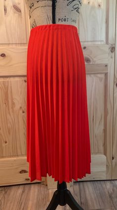 "Red vintage \"Vicki Wayne's slip over pleated mid calf skirt. Rayon  Waist 25\", length 25\" Size small Circa 1960-70. Good vintage condition. Original unaltered elastic waistband  Red wrap around mid calf skirt. Waist 26\", length 29\". Nylon/Antron 82%, Lycra/spandex 18%. Size small  Good vintage condition." Red Flowy Vintage Skirt, Red Vintage Tiered Skirt, Vintage Flowy Red Skirt, Vintage Red Skirt With Ruffles, Vintage Red Cotton Skirt, Mid Calf Skirt, Vintage Skirts, Red Vintage, Vintage Skirt