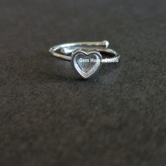 925 Sterling Silver 6mm Heart Shape Blank Bezel Adjustable Ring, Good for Resin & Ashes Work, Breastmilk/Keepsake DIY, Crafts, Promise Ring Description : Metal: 925 Solid Sterling Silver Size: Heart 6mm Type: Adjustable Ring,  Qty. 1 Ring Shape. Heart  Also Available in Solid Gold ( 9k,14k,18k and More) in White, Rose and Yellow Solid Gold. Please ask for Price.  ring base tray, ring setting, DIY ring, ring base setting, DIY ring bezel, ring bezel, keepsake ring, breast milk ring, birthstone ring, stackable ring,925 silver ring, resin ring settings, stacker ring, Heart Ring, Silver Ring, 925 Silver Ring, Resin work Ring, New Year Ring, Gift For Her, bezel ring, New Year Offer, adjustable Silver Ring, Valentine Gifts, Engagement, Gift For MOM, Gift For Girls, stackable Rings, DIY settings, Stackable Sterling Silver Heart Ring Perfect For Gifts, Sterling Silver Heart Ring Gift, Adjustable Silver Heart Cut Ring, Silver Heart Ring With Birthstone, Silver Adjustable Heart Cut Ring, Adjustable Heart Ring For Anniversary, Sterling Silver Open Heart Rings For Mother's Day, Sterling Silver Heart Ring With Birthstone, Dainty Silver Heart Ring For Mother's Day