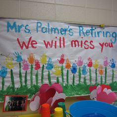 a sign that says mrs palmer's returning we will miss you on the wall