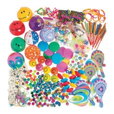 a pile of assorted items including balloons, beads, and other things on a white background