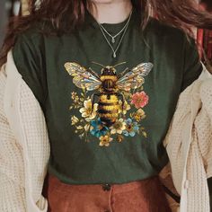 Queen Bee Shirt Vintage Floral Bee Cottagecore Aesthetic T-Shirt Dark Academia Clothes Gift For Nature Lover  📣 INFORMATION * All shirts are UNISEX * 100% Airlume combed and ringspun cotton (fiber content may vary for different colors) * Wash and dry normally (on cool for best results) 👕 SIZING * For an oversized fit, select two or three sizes up from your normal size * Model is wearing size L * Sizing runs true to size * Most women find their typical size works best, since they are meant to f Bee Cottagecore, Queen Bee Shirt, Bee Shirt, Dark Academia Clothes, Academia Clothes, Aesthetic T Shirts, Cottagecore Aesthetic, Queen Bee, Gifts For Nature Lovers