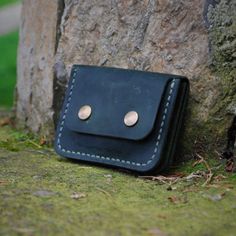 This Minimalist small Leather Wallet and Card Holder is designed to adapt to your minimalist lifestyle. Simply store your credit cards, cash and coins in a minimal style. This Leather minimal front pocket wallet is made from high-quality Crazy Horse full-grain leather, with 100% handwork. Which has a unique texture and is designed to last a lifetime.  - Premium quality Crazy Horse leather  - One opening for quick access. - Three slots for all your, cards, money, and some coins. - Unique and simple design. Leather Colour Options - Black - Cat - Magenta - Crimson - Navy Blue - Olive SHIPPING: This item is MADE TO ORDER specially for you. It will be shipped within 1-5 days after payment. Please note there could be some differences in the color tone between photos and the actual item due to pe Minimalist Bifold Coin Purse With Coin Pocket, Minimalist Bifold Coin Purse With Card Slots, Practical Wallet With Card Slots, Minimalist Bifold Coin Purse With Interior Card Slots, Practical Rectangular Wallet With Card Slots, Practical Wallets With Card Slots For Everyday Use, Minimalist Trifold Wallet With Card Slots For Everyday, Minimalist Bifold Coin Purse As Gift, Minimalist Trifold Wallet With Coin Pocket