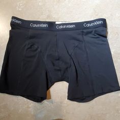 Black Boxer Brief Underwear By Calvin Klein. Logo Waistband. 95% Cotton/ 5% Elastane Nwot Calvin Klein Fitted Boxer Briefs For Sports, Calvin Klein Boxer Briefs For Sports, Calvin Klein Solid Color Sports Boxer Briefs, Calvin Klein Black Multi-pack Boxer Briefs, Black Compression Boxer Briefs Multi-pack, Sporty Black Calvin Klein Bottoms, Calvin Klein Sporty Black Bottoms, Black Multi-pack Boxer Briefs, Black Fitted Multi-pack Boxer Briefs