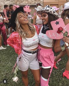 two women dressed up in costumes and hats