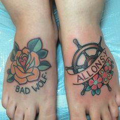 two people with tattoos on their feet