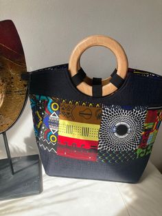 Stylish Ankara African Bag for Women and Girls Tote Bag With Removable Pouch, Large Capacity Rectangular Bags As Fashion Accessory, Large Capacity Rectangular Bag As Fashion Accessory, Fashion Tote Bag With Top Carry Handle, Multicolor Top Handle Bucket Bag, Multicolor Rectangular Bucket Bag For On-the-go, Multicolor Top Handle Bucket Bag For Daily Use, Black Shoulder Bag As Fashion Accessory, Multicolor Top Handle Bucket Bag With Detachable Handle