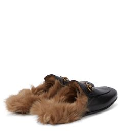 Luxury Gold Slip-on Mules, Luxury Formal Slippers With Flat Heel, Luxury Slip-on Mules With Branded Insole, Luxury Slippers With Leather Sole And Round Toe, Gucci Slip-on Mules, Luxury Leather Sole Slip-on Mules, Gucci Leather Slip-on Slides, Luxury Gucci Slip-on Slides, Luxury Leather Sole Slip-on Slides