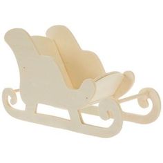 a white wooden toy sleigh with wheels