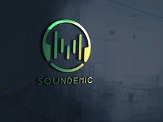 the logo for soundmetric is shown in green and gold colors on a dark background