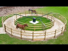 an aerial view of a horse in its pen