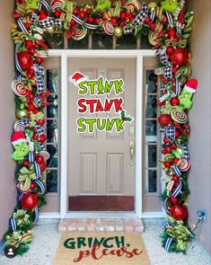 an entrance decorated with christmas decorations and candy canes for st nick stump's