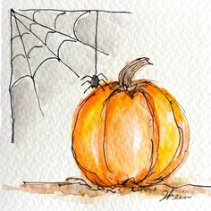 a drawing of a pumpkin with a spider web on it