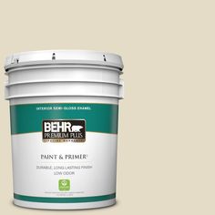 the behr paint color is shown in an open - mouthed bucket, and it's light green