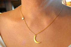 Chain is adjustable. Minimalist Moon-shaped Jewelry With Star Charm, Dainty Star-shaped Jewelry With Moon Charm, Dainty Crescent Jewelry With Star Charm, Dainty Crescent-shaped Jewelry With Star Charm, Lunar Jewelry, Gold Star Necklace, Moon And Star Necklace, Black Leather Choker, Simple Choker