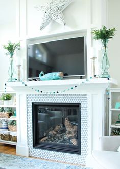 a living room with a fire place and a television on top of the mantel