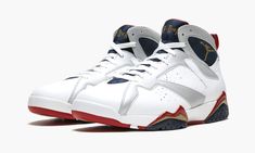 The original and iconic colorway worn by Michael Jordan during the 1992 Olympics, this Air Jordan 7 features a white and silver upper with patriotic accents. No Air Jordan 7 collection can be complete without a pair of this historic colorway. Authentic Jordans, Jordan 7, Jordan Sneakers, Mens Nike Shoes, Michael Jordan, Nike Air Jordan, Air Jordan Sneaker, Navy And White, Luxury Branding