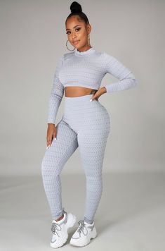 You deserve to be comfortable without sacrificing your sex appeal. The "Roxy Two Piece Pant Set- Gray" is just what you need to break necks. Pair with your favorite heels, mini bag, and "Goldie Rectangle Drop Earrings" to complete the look. Stretch two piece set Long sleeve cropped top Mock neck High waist legging pant Model is wearig size small Tight Crop Top, Crop Top And Pants Set, Crop Top And Pants, Everyday Leggings, Turtle Neck Crop Top, Early Spring Outfits, Top And Pants Set, Current Fashion Trends, Petite Outfits