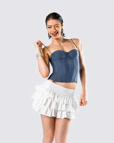 You’ll always be the one they want but can’t have in this look 😌 Featuring a slate mesh corset top and an ivory ruffle micro mini skirt - this playful two-piece set will bring everyone to their knees 🙌 Ruffled Mini Corset For Night Out, Chic Mini Length Corset With Ruffles, Y2k Fitted Ruffle Skort, Fitted Mini Corset With Ruffles, Spring Flirty Ruffled Corset, Club-ready Fitted Mini Skirt With Ruffles, Chic Mini Corset With Ruffles, Luxury Ruffled Mini Skirt, Light Blue Ruffled Mini Skirt